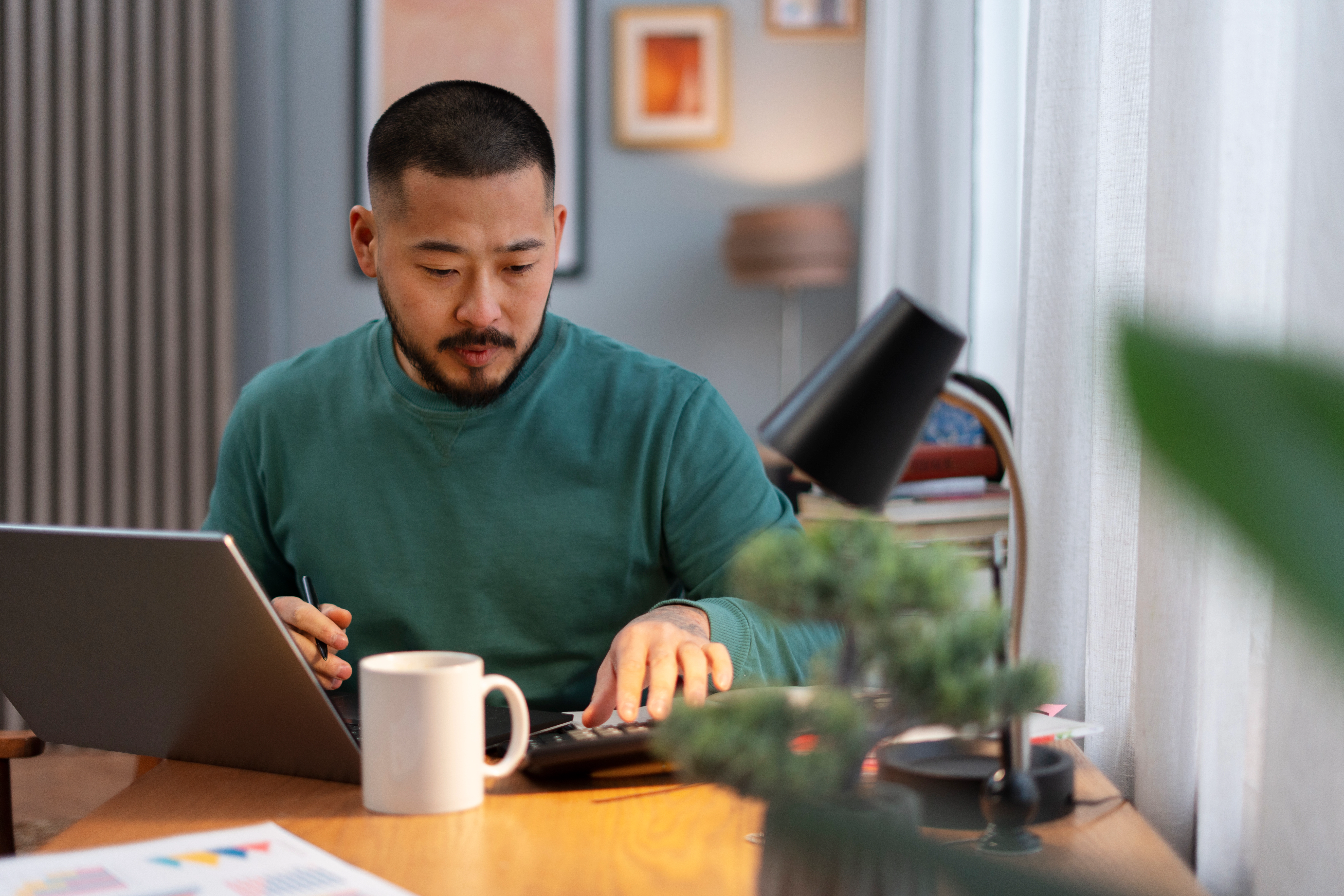 man working freelance on laptop