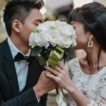 bride and groom posing for wedding pictures