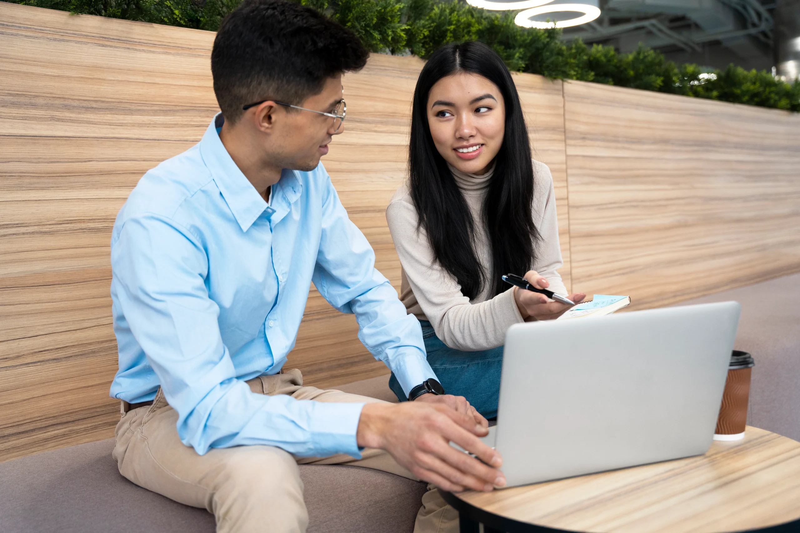 two workers working on freelance project